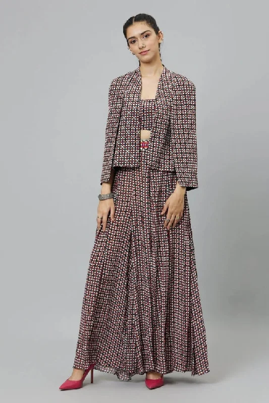METAL EMBELLISHED BLACK GEOMETRIC PRINT STRUCTURED CAPE JACKET, TEAMED WITH BOX PLEATED PANTS AND BUSTIER