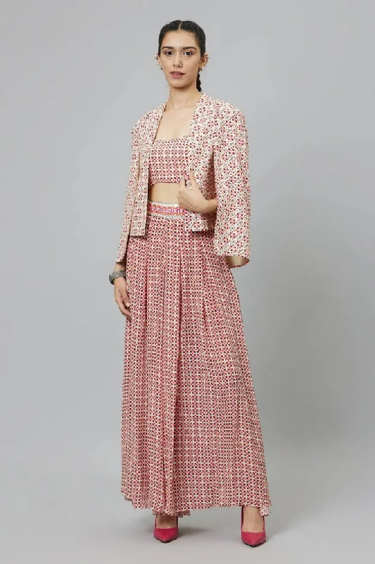 METAL EMBELLISHED IVORY GEOMETRIC PRINT STRUCTURED CAPE JACKET, TEAMED WITH BOX PLEATED PANTS AND BUSTIER METAL EMBELLISHED IVORY GEOMETRIC PRINT STRUCTURED CAPE JACKET, TEAMED WITH BOX PLEATED PANTS AND BUSTIER